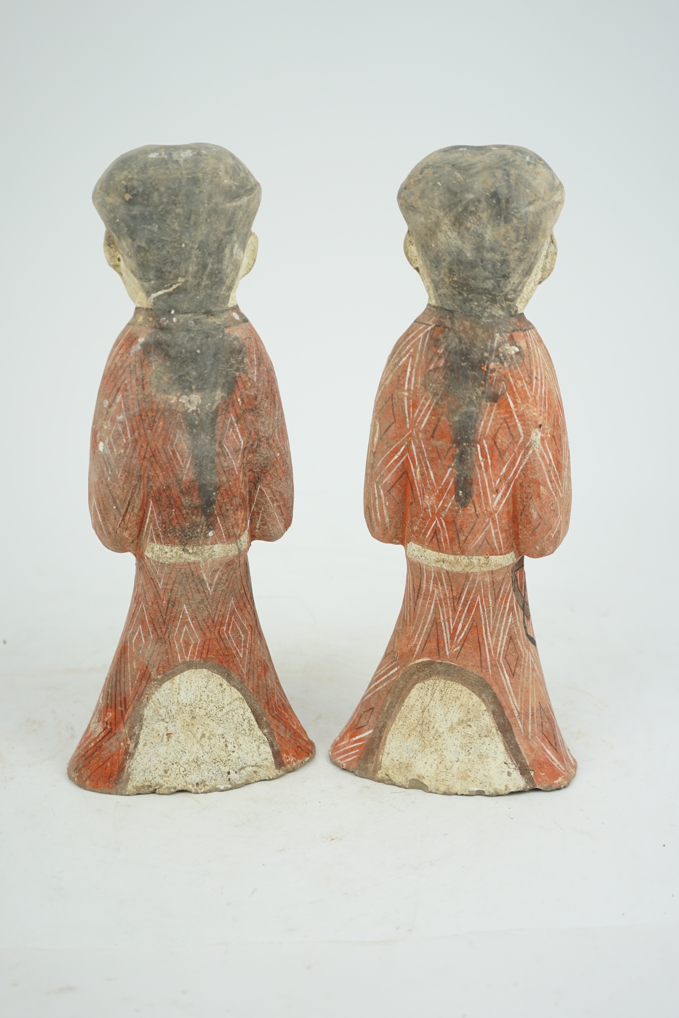 A pair of Chinese Han style painted pottery ladies, 29.5cm